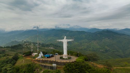 Free Discover the stunning Cristo Rey statue overlooking the lush Valle del Cauca, Colombia. Stock Photo