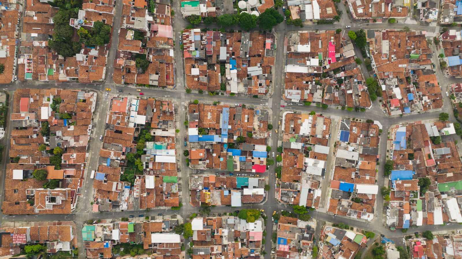 Aerial view of a dense city street grid, photo by K on Pexels