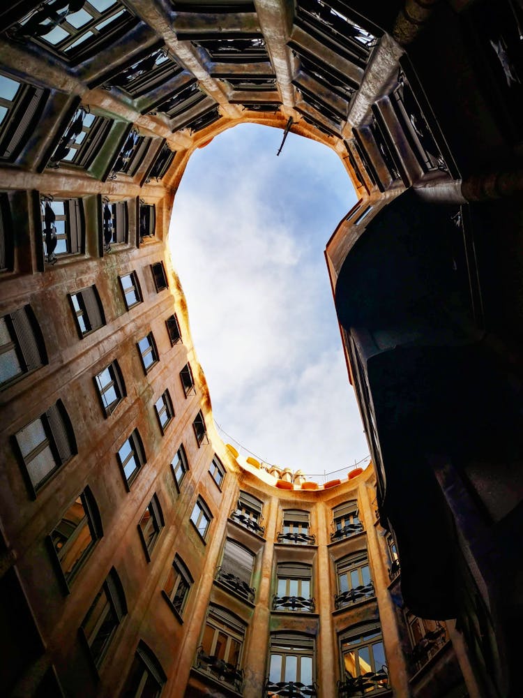 Brown Concrete Building Under Blue Sky