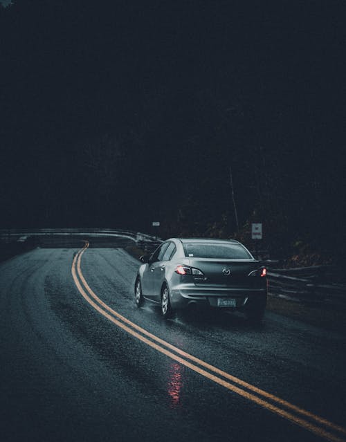 Black Car on Road during Night Time