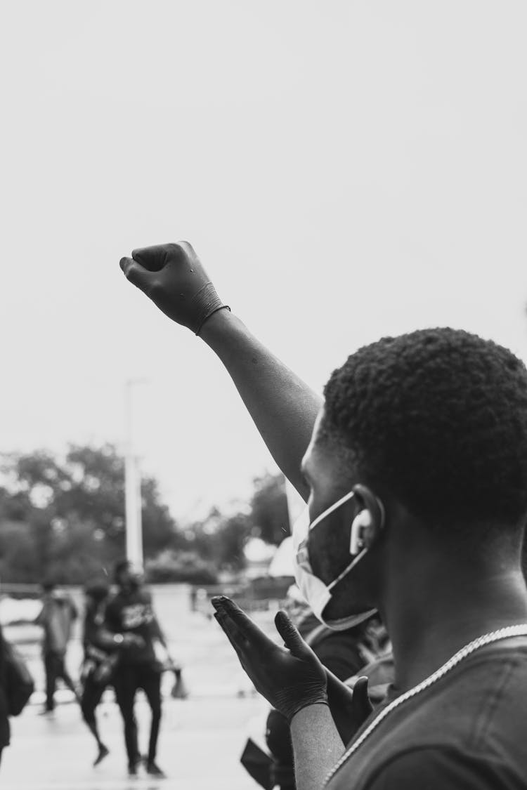 Man With His Fist In The Air On A Protest 