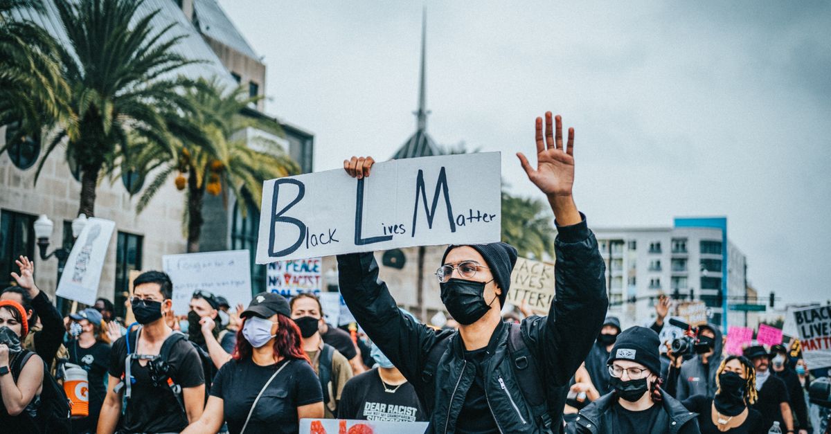 Face Protesting Crowd of People Wearing Face Masks Protesting · Free Stock Photo