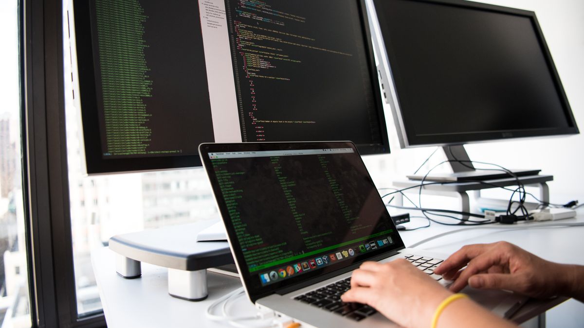 Engineers reviewing API architecture and integration maps
