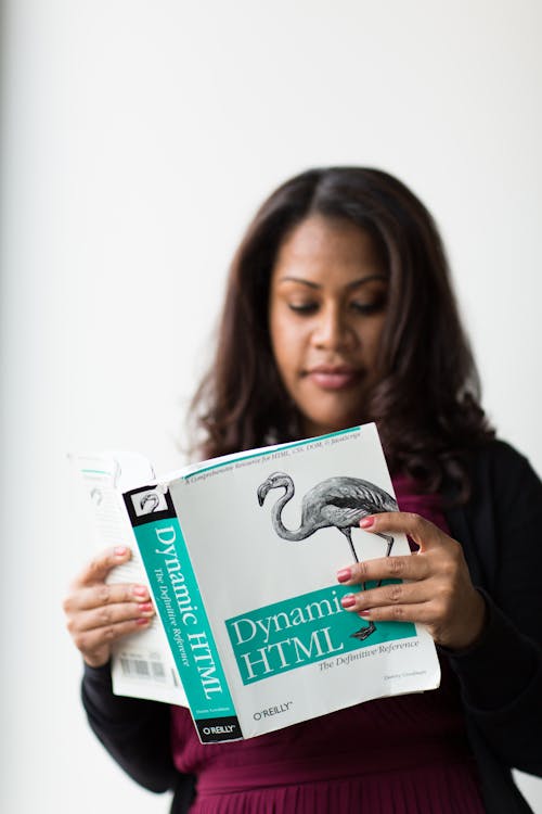 Woman Holding Dynamic Html Book