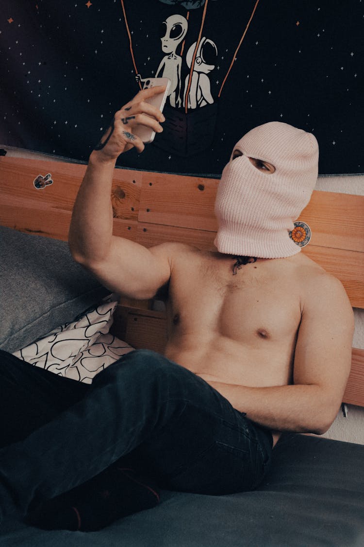  Man Wearing White Ski Mask Taking Selfie