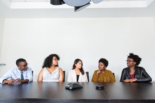 Five People Having Conversation