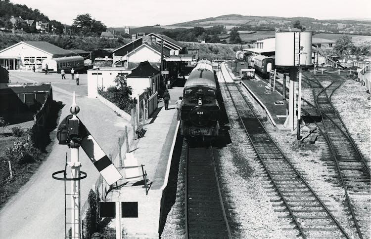 Grayscale Photo Of South Devon Railway