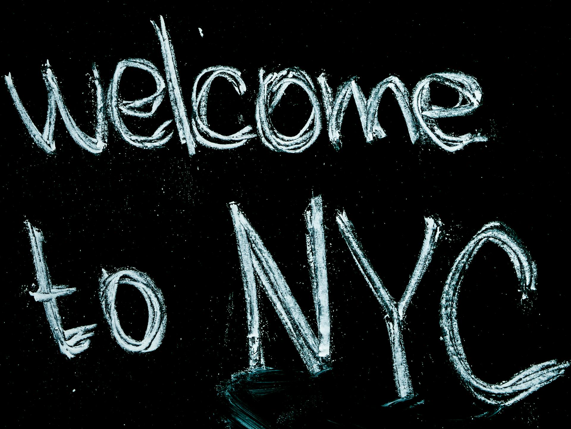 Black Background With Welcome to Nyc Text Overlay