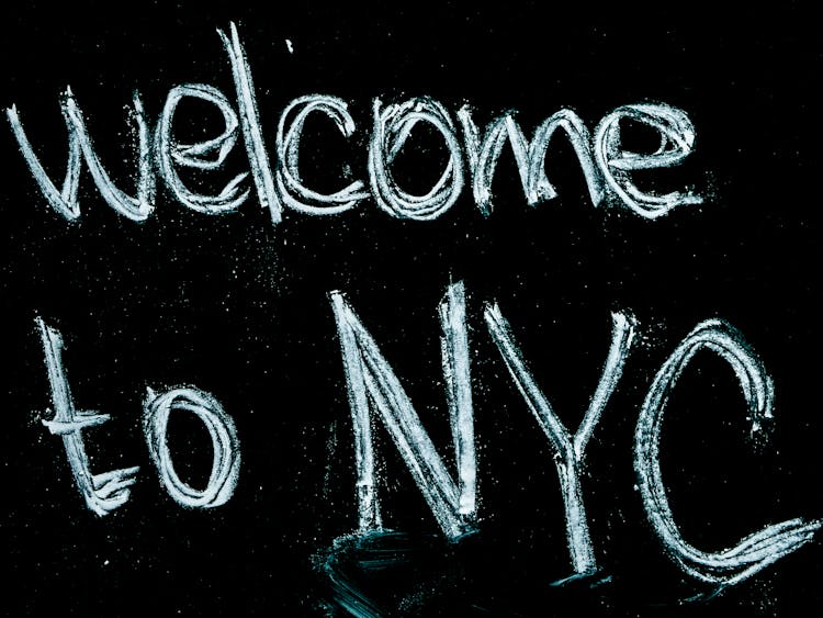 Black Background With Welcome To Nyc Text Overlay