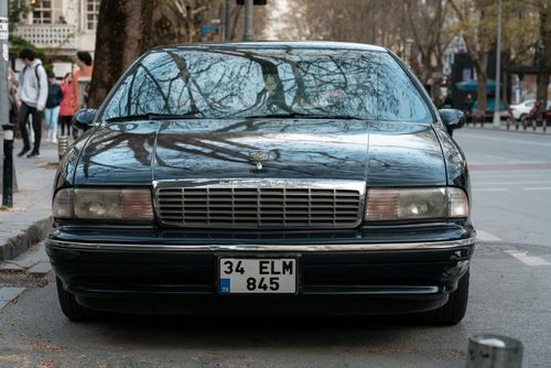 Free Front view of a vintage car with Istanbul license plate on a city street. Stock Photo