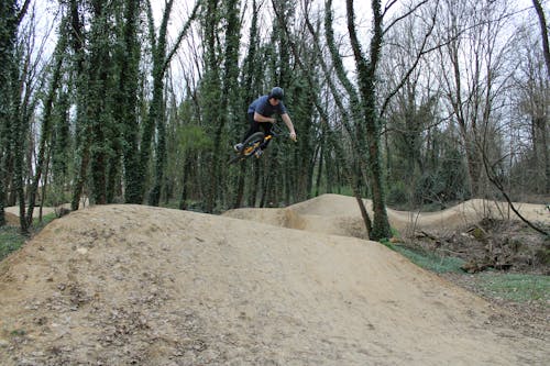 A Man Jumping with Bicycle