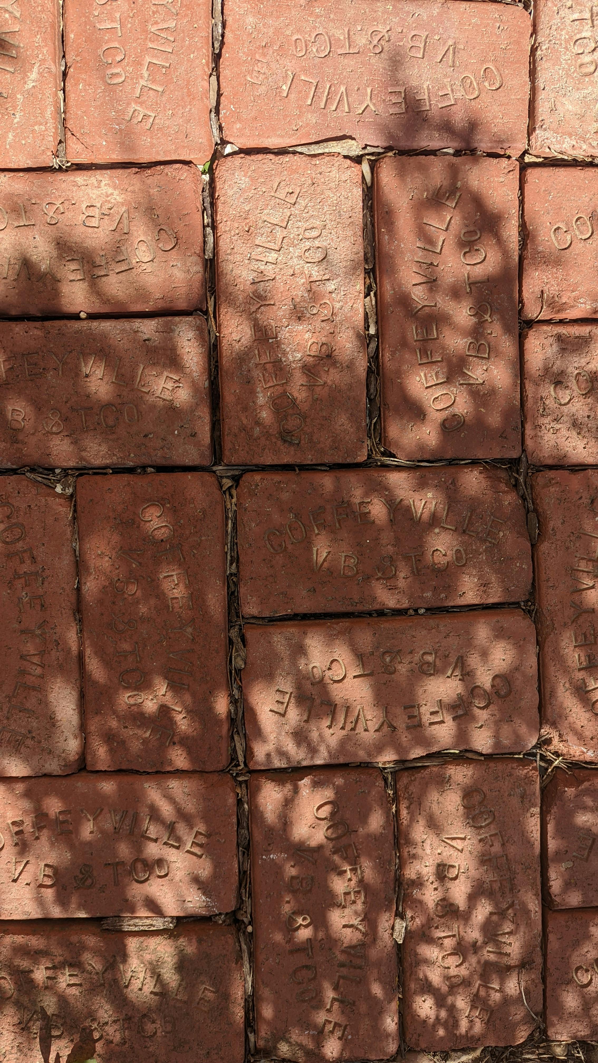 Bricks with Etching in Closeup Shot · Free Stock Photo