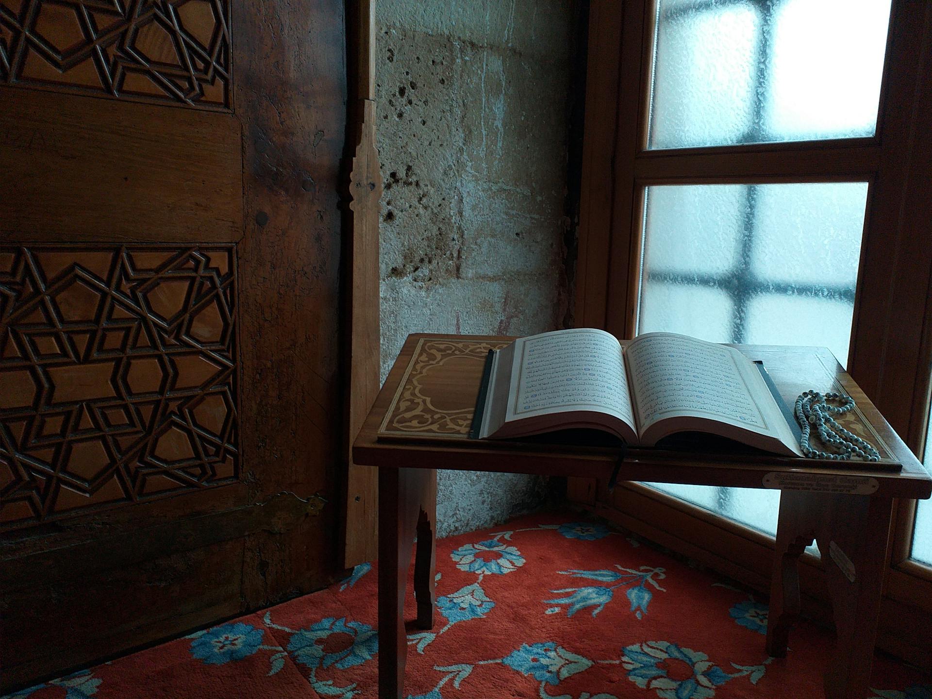 Open Koran on Wooden Stand