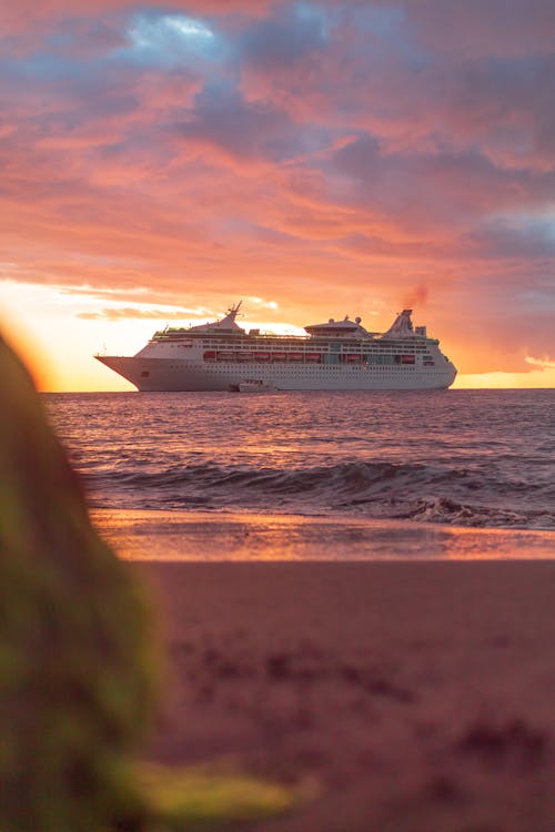 A Cruise Ship Sailing during Sunset