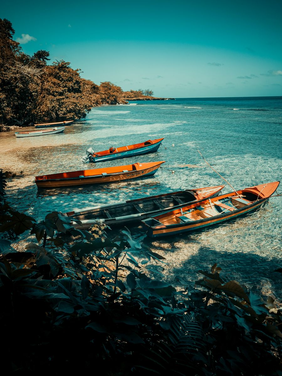 Colourful wooden boats on a Jamaican shore