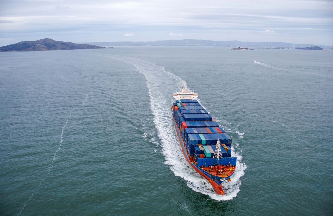 Aerial view of a container ship sailing the open ocean