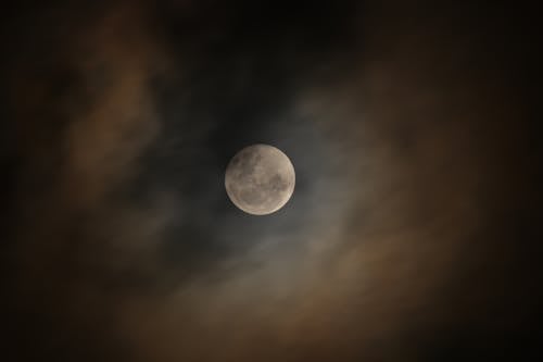Free A View of the Moon in the Dark Sky Stock Photo