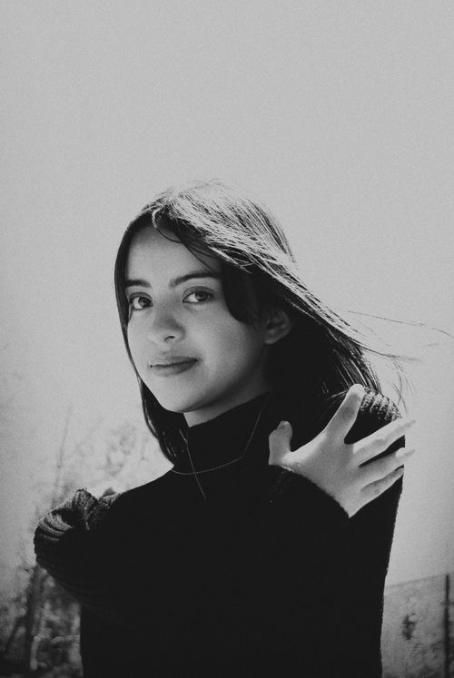 Free Elegant black and white portrait of a woman posing outdoors in Pachuca, Mexico. Stock Photo