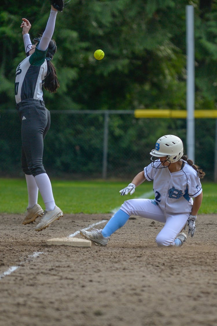 Women Playing The Game Of Baseball