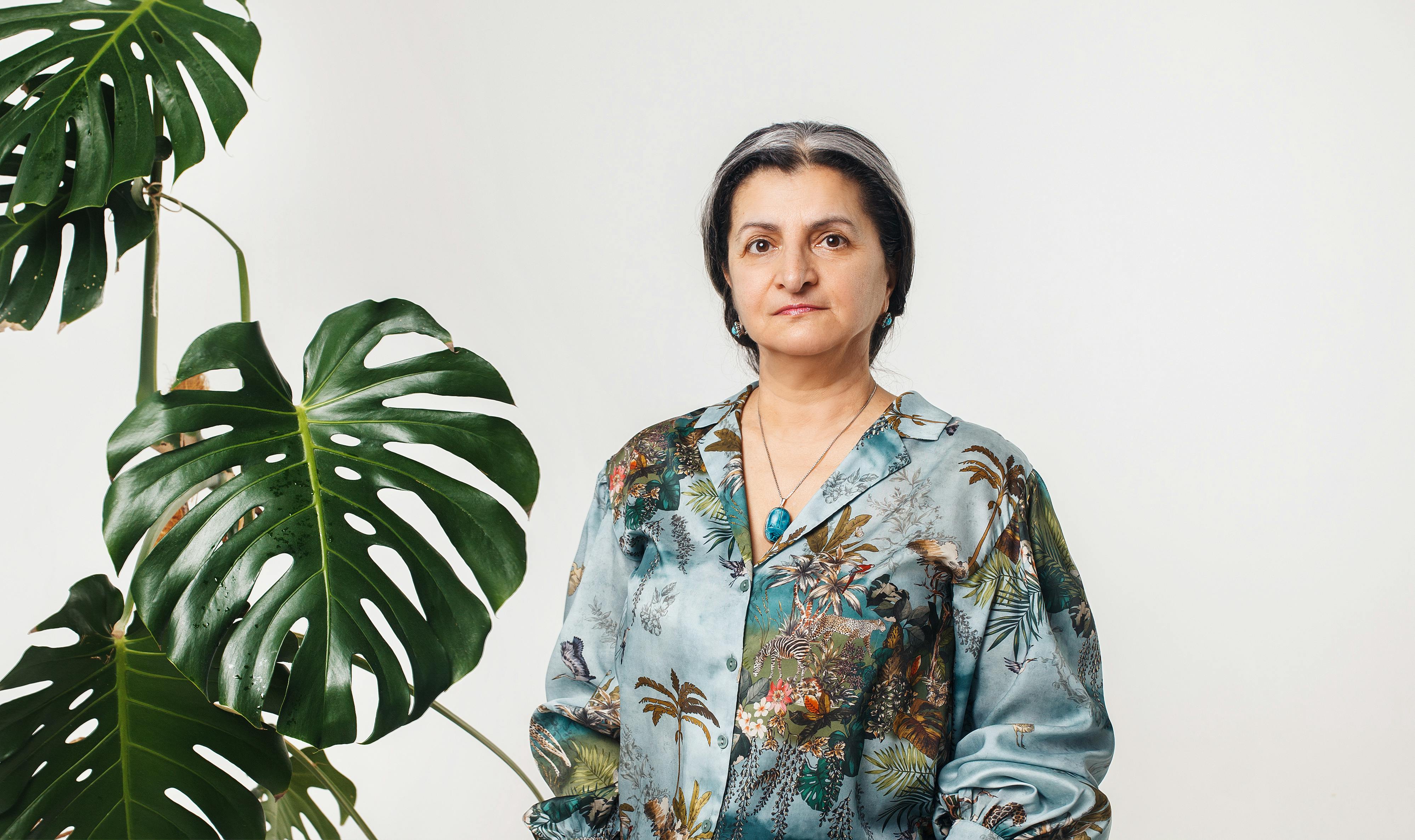 woman and plant on white background