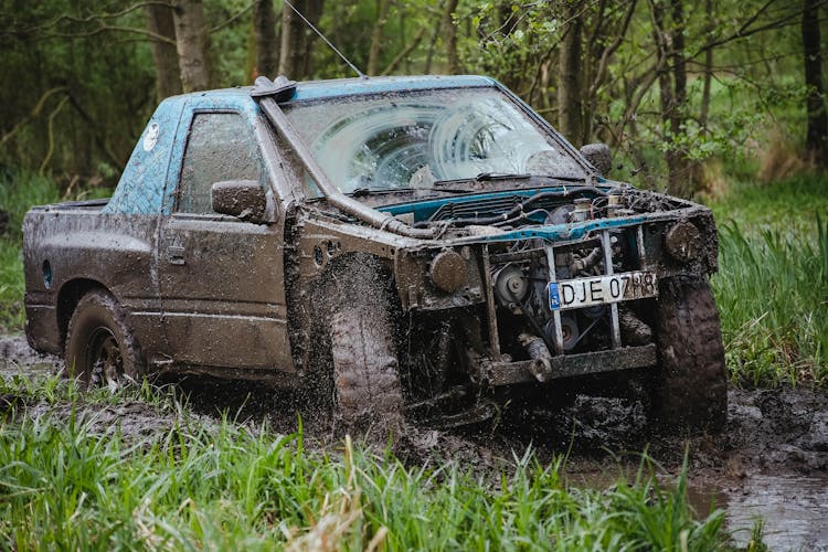 Trail Truck On A Muddy Puddle