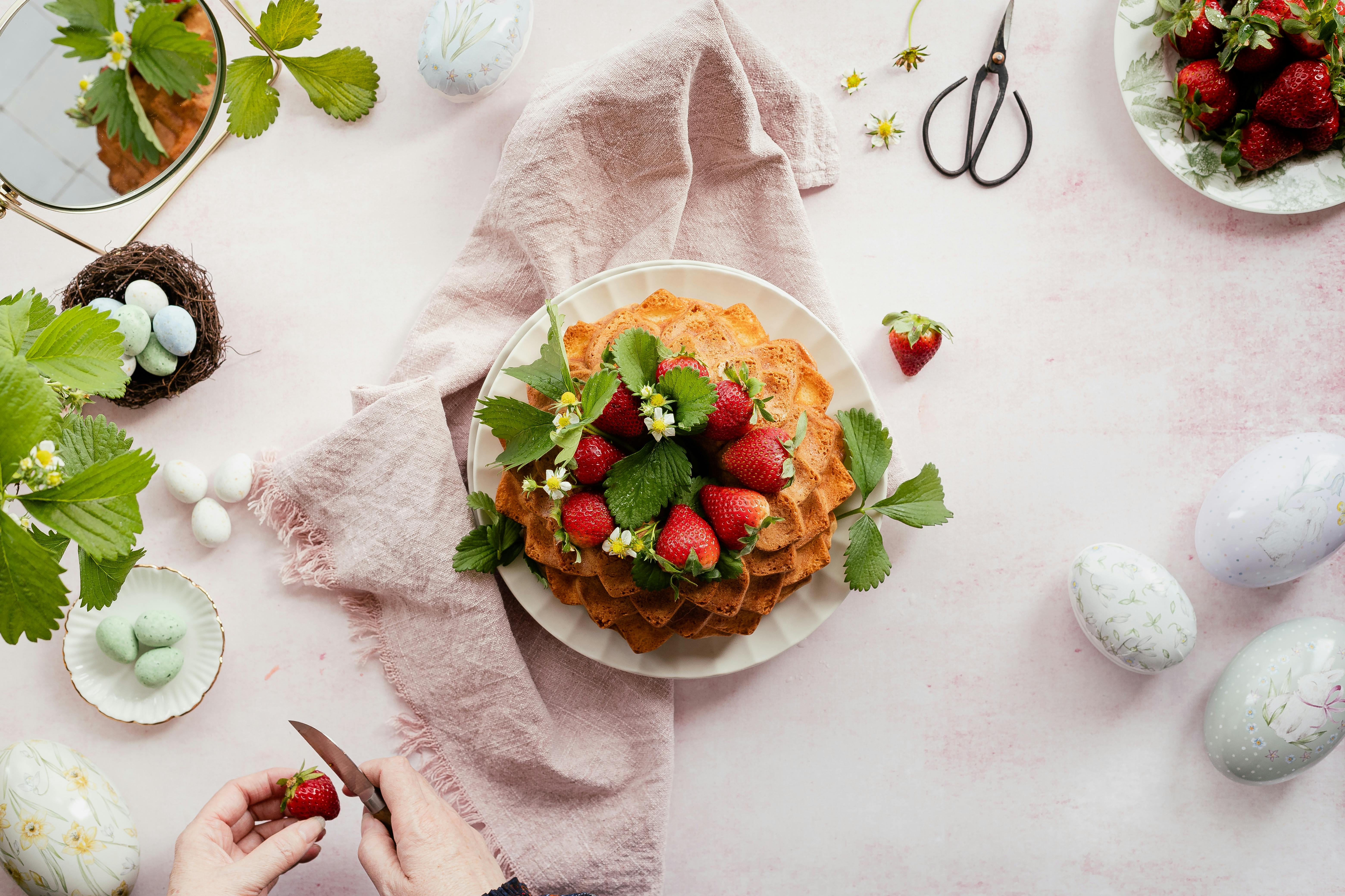 delicious homemade cake decorated with fresh strawberries