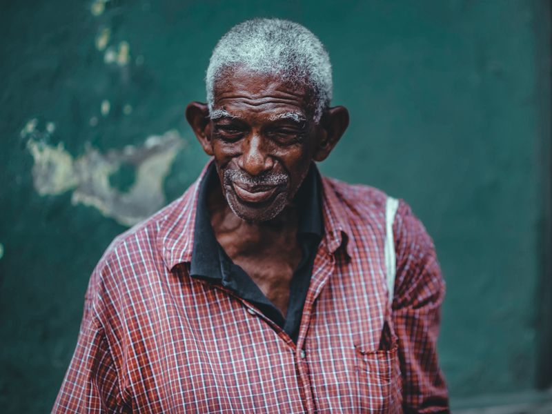 A dignified portrait of an older Black man. An enlarged prostate is a common part of aging, and the urinary symptoms it causes are manageable.
