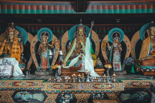 Free Detailed view of a Hindu altar featuring vibrant sculptures and traditional decor. Stock Photo