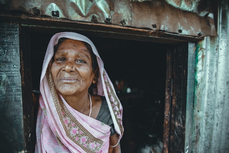 Elderly Woman With Scarf On Head 