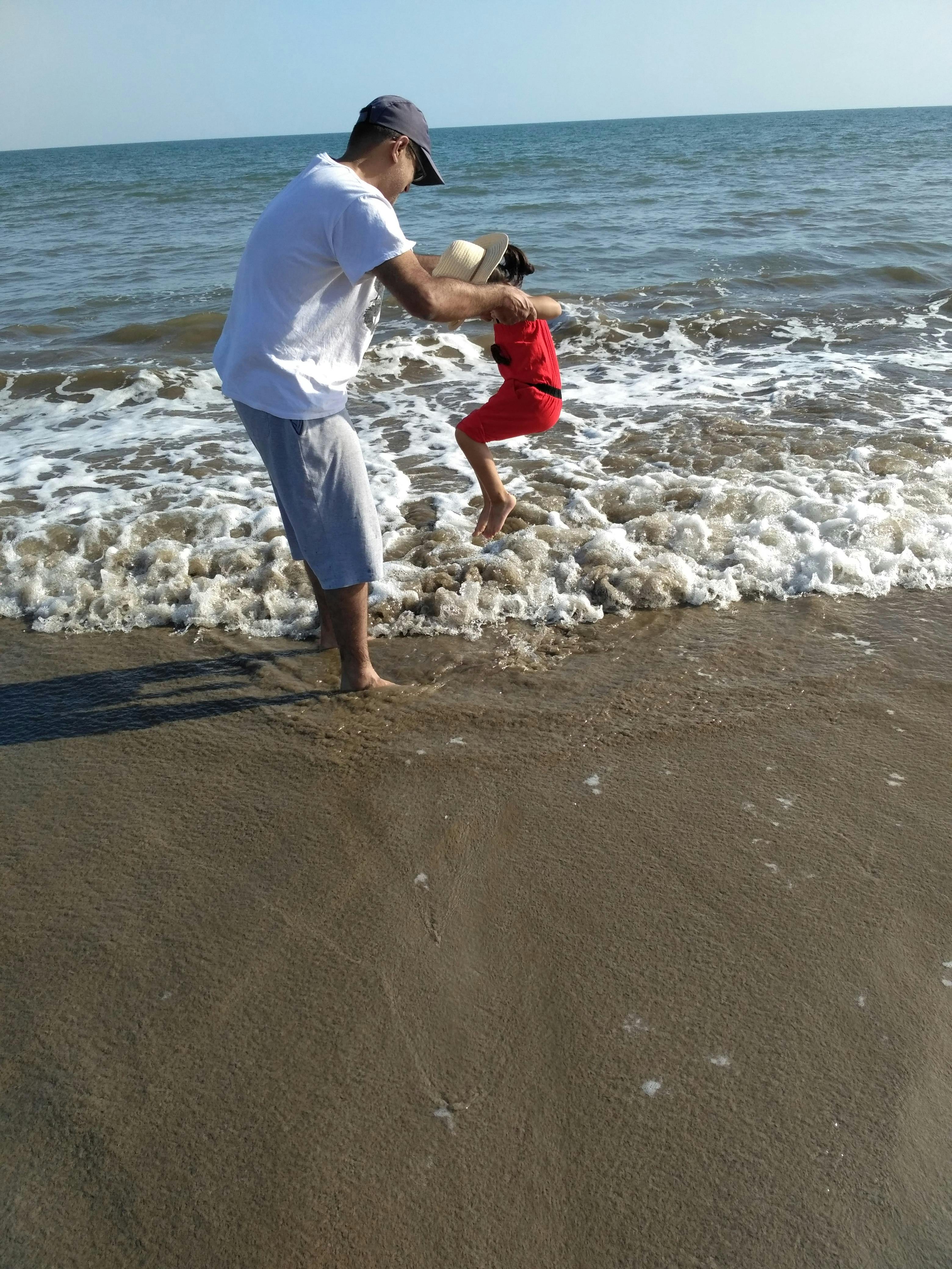 Foto Stok Gratis Tentang Ayah Dan Anak Perempuan Pantai