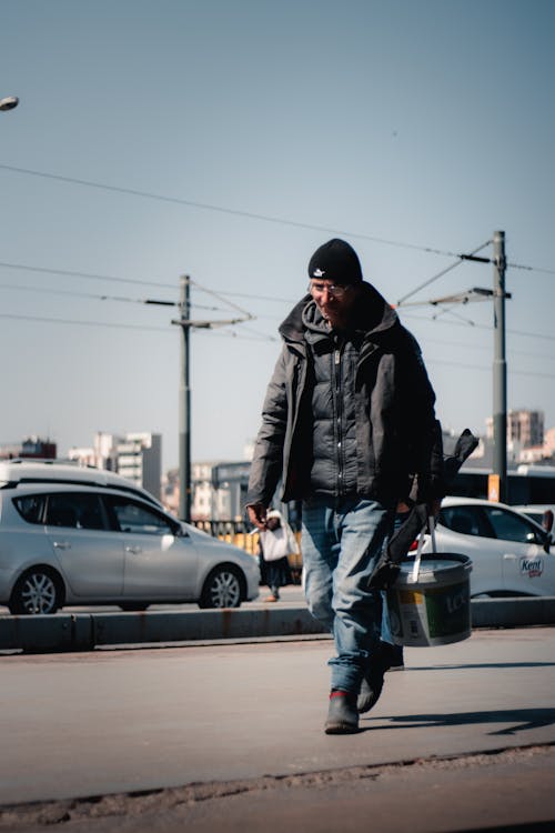 Man Wearing Black Bubble Jacket
