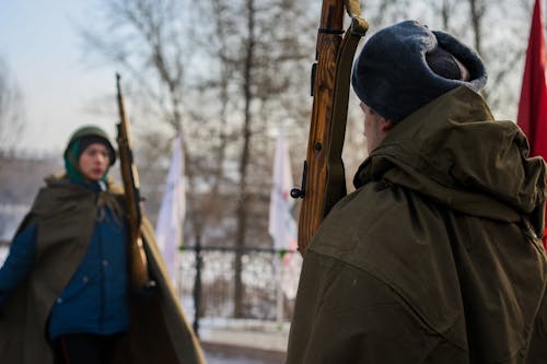 Soldiers holding Wooden Rifles 