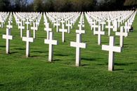 White Wooden Cross on Green Grass Field