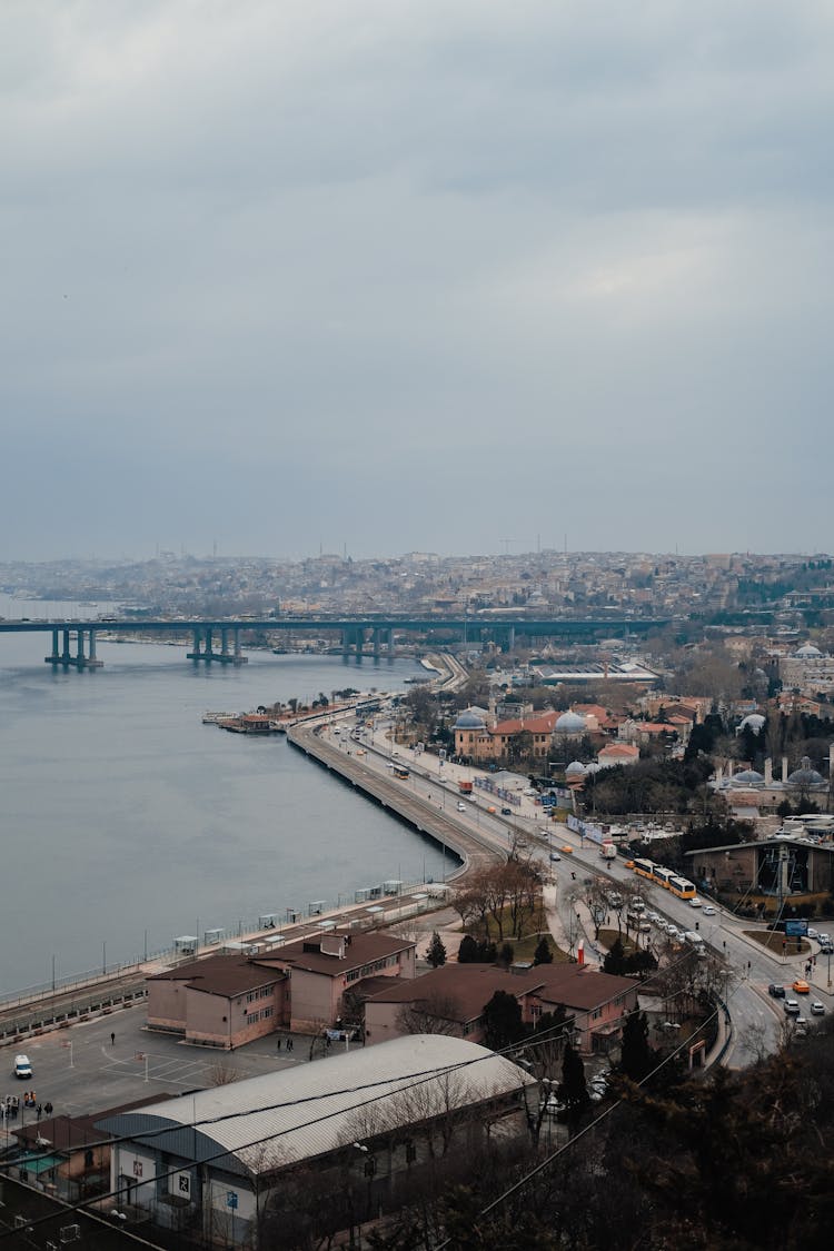 Aerial Shot Of River, Road And City