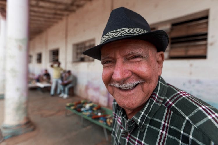 Smiling Man In Hat