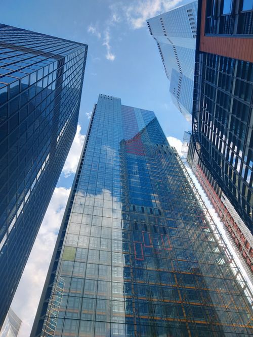 Free A stunning view of modern skyscrapers with reflective glass in England's cityscape. Stock Photo