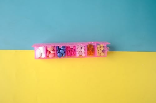 Free Yellow Pink and White Plastic Toy Stock Photo