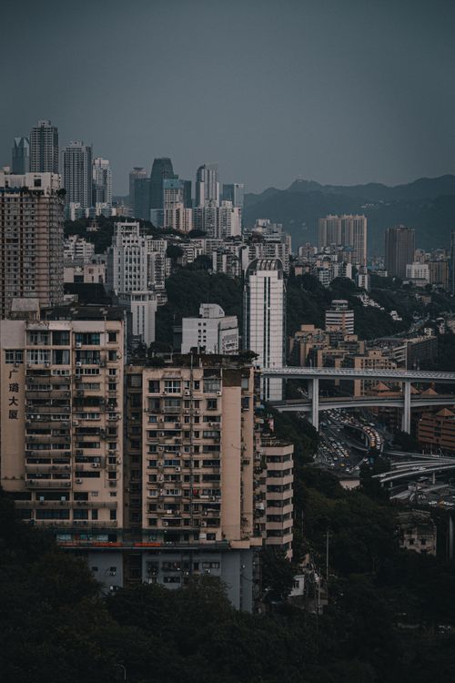 Free Aerial view of Chongqing's dense urban skyline featuring diverse architecture. Stock Photo
