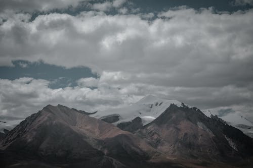 Gratis Immagine gratuita di catena montuosa, cielo, fotografia con le nuvole Foto a disposizione
