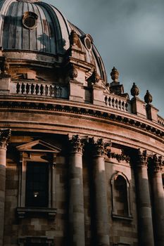 A striking view of the Radcliffe Camera in Oxford, showcasing neoclassical architecture at dusk.