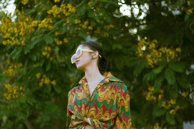 Woman In Yellow Sunglasses Posing