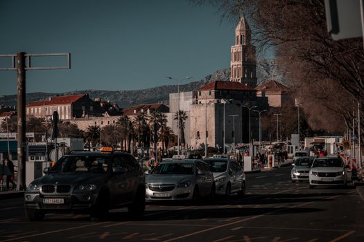 Urban scene with cars near the Cathedral of Saint Domnius in Split, Croatia.