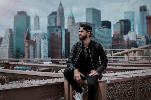 Man Wearing Black Zip-up Leather Jacket