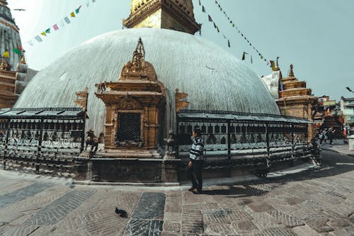 A Man Standing in Front of Swayambhu