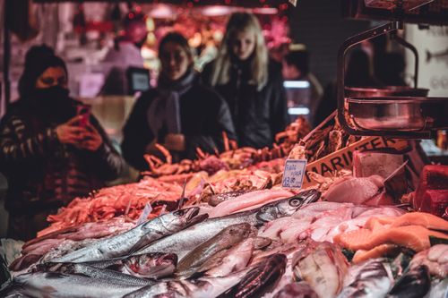 Free Fresh seafood displayed at a bustling market in Barcelona, Spain. Stock Photo