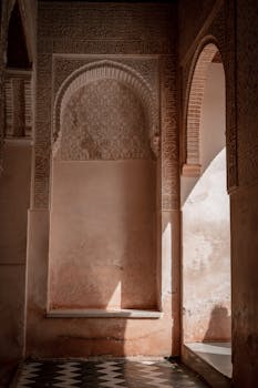 Captivating interior shot showcasing architectural details of the Alhambra, Granada.