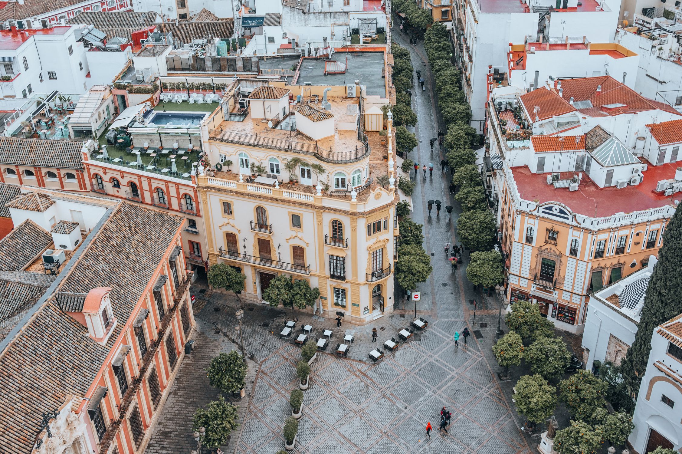 Explore the stunning aerial view of Seville's historic cityscape featuring unique architecture and vibrant streets