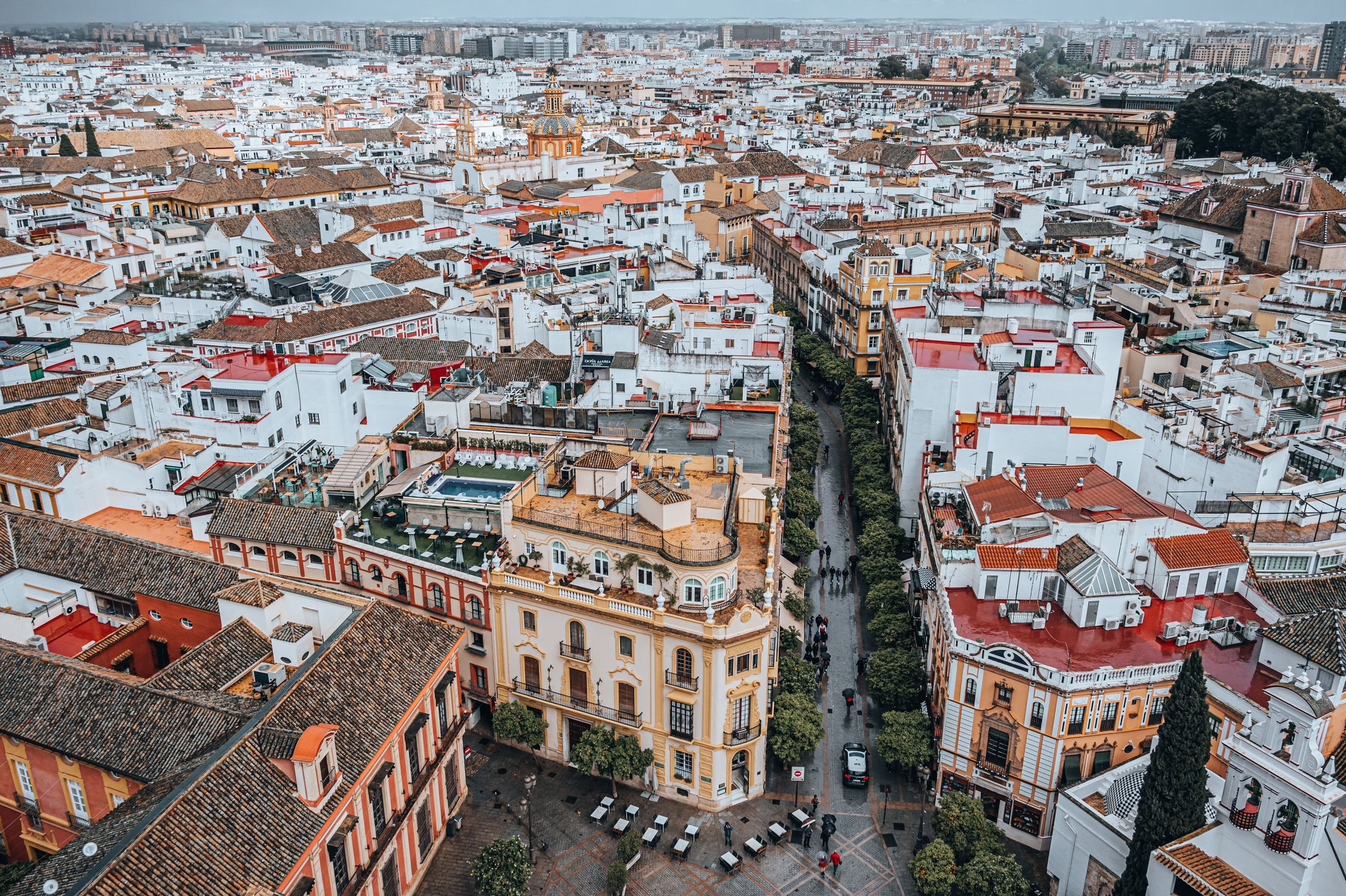 Captivating aerial view of Seville, Spain showcasing its dense, historic urban architecture
