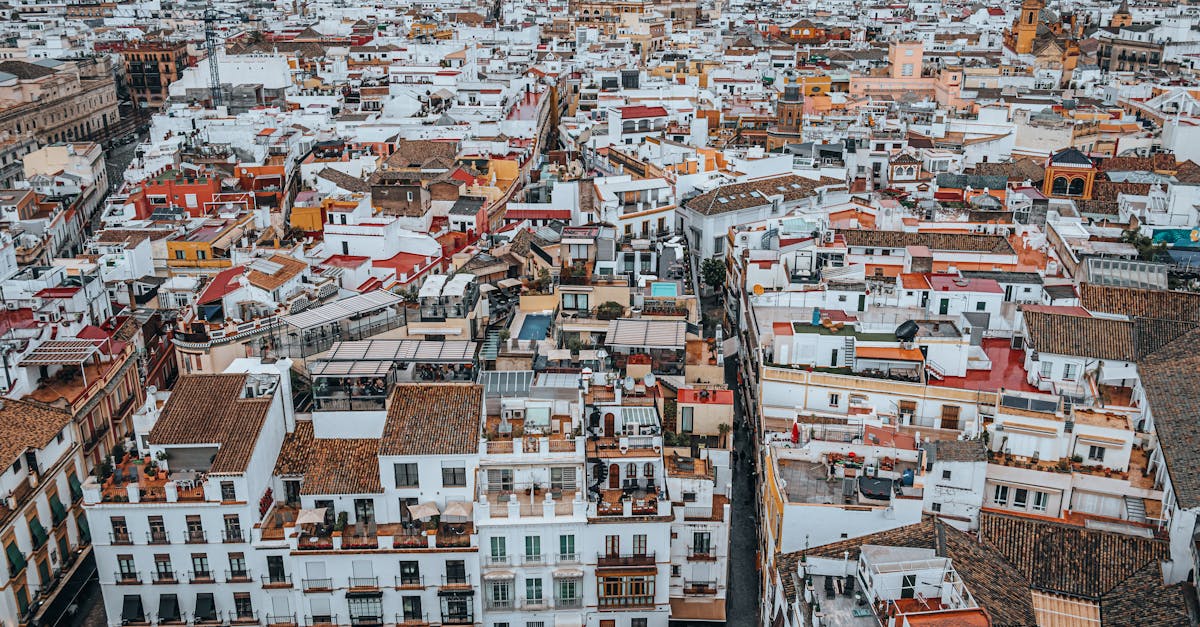 Explore the charming and colorful cityscape of Seville, Spain from above.