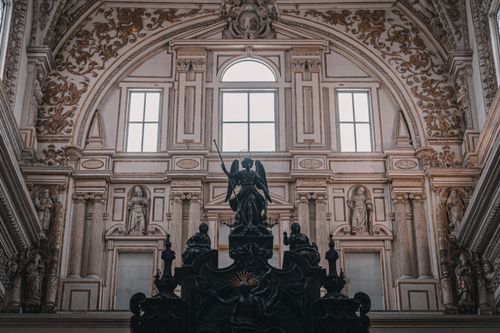 Free Explore the stunning architectural details inside Córdoba's iconic Mosque-Cathedral. Stock Photo